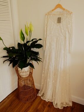 asos edition embroidered bodice wedding maxi dress ASOS DESIGN Curve embroidered plunge long sleeve maxi wedding dress in ivory